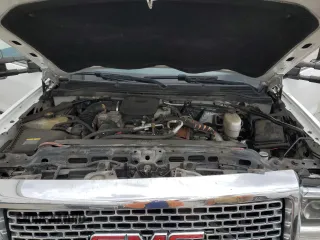 2016 GMC Sierra 3500HD SLT z VIN 1GT42XC86GF277877, wystawiony jako Copart lot #55825015 z przebiegiem 205 718 mil mil oraz Szkody całkowita. Historia ofert i sprzedaży dostępna na DreamBid. Obrazek 11.
