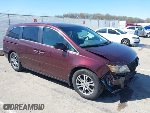 2012 Honda Odyssey EX with VIN 5FNRL5H42CB136915, listed as a IAAI auction lot 41972714 with 211,729 mi miles and . Bid and sale history available at carsss.com. Image 1.