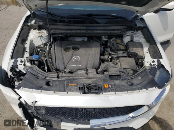 2021 Mazda CX-5 Touring z VIN JM3KFBCM9M1386068, wystawiony jako Copart lot #51735225 z przebiegiem 68 728 mil mil oraz Szkoda całkowita • Salvage title. Historia ofert i sprzedaży dostępna na DreamBid. Obrazek 14.
