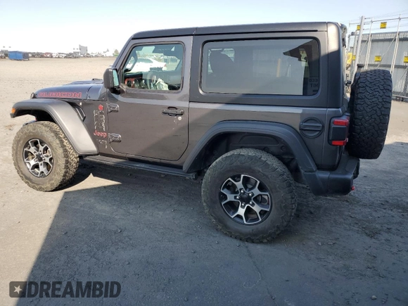2023 Jeep Wrangler Rubicon with VIN 1C4HJXCG5PW652704, listed as a Copart auction lot 59762475 with 19,924 mi miles and Salvage title. Bid and sale history available at DreamBid. Image 2.