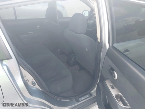 2011 Nissan Versa 1.8 SL with VIN 3N1BC1CP7BL446671, listed as a IAAI auction lot 42003858 with 96,939 mi miles. Bid and sale history available at carsss.com. Image 8.