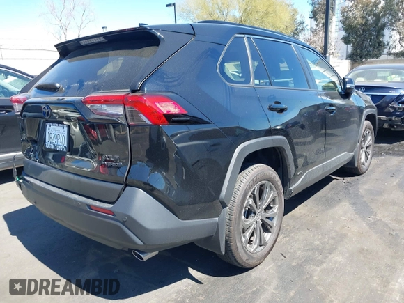 2024 Toyota RAV4 Hybrid XLE Premium with VIN JTMB6RFV0RD126685, listed as a IAAI auction lot 41870692 with 21,637 mi miles. Bid and sale history available at carsss.com. Image 4.