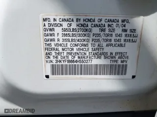 2004 Honda Pilot EX with VIN 2HKYF18664H550277, listed as a IAAI auction lot 41966015 with 285,700 mi miles. Bid and sale history available at carsss.com. Image 9.