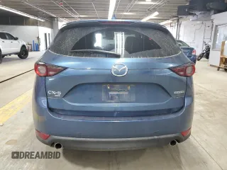 2020 Mazda CX-5 Touring z VIN JM3KFBCM7L0855159, wystawiony jako Copart lot #53161635 z przebiegiem 39 154 mil mil oraz Szkoda całkowita • Salvage title. Historia ofert i sprzedaży dostępna na DreamBid. Obrazek 6.