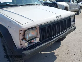 1996 Jeep Cherokee Sport z VIN 1J4FJ68S3TL226188, wystawiony jako IAAI lot #42460538 z przebiegiem 217 118 mil mil oraz . Historia ofert i sprzedaży dostępna na DreamBid. Obrazek 6.
