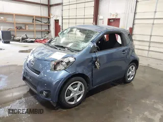 2012 Scion iQ with VIN JTNJJXB01CJ010943, listed as a IAAI auction lot 41742923 with 1 mi miles. Bid and sale history available at carsss.com. Image 2.