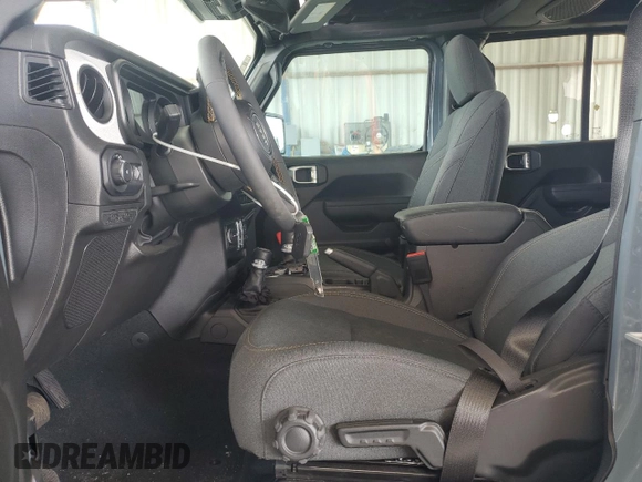 2024 Jeep Wrangler Sport S with VIN 1C4PJXDG3RW341205, listed as a Copart auction lot 48971235 with 4,298 mi miles and Salvage title. Bid and sale history available at DreamBid. Image 7.