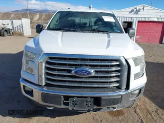 2015 Ford F-150 XLT with VIN 1FTEW1EG9FKD92005, listed as a IAAI auction lot 41706605 with 205,890 mi miles. Bid and sale history available at carsss.com. Image 12.