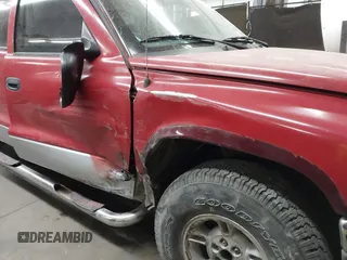 2001 Dodge Dakota Sport with VIN 1B7HL2AN81S296293, listed as a IAAI auction lot 41470036 with 203,323 mi miles. Bid and sale history available at carsss.com. Image 6.