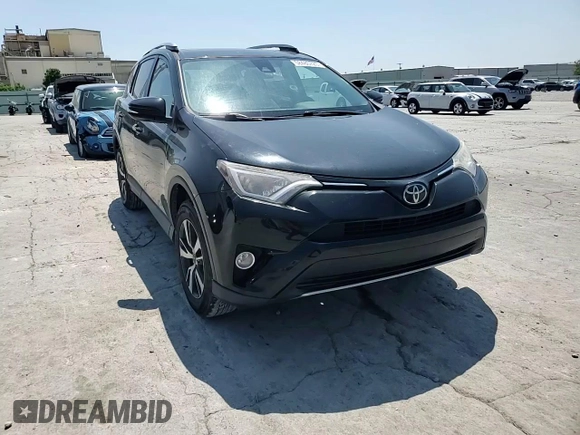 2018 Toyota RAV4 XLE z VIN 2T3RFREV4JW812199, wystawiony jako Copart lot #58485725 z przebiegiem 96 576 mil mil oraz Szkoda całkowita • Salvage title. Historia ofert i sprzedaży dostępna na DreamBid. Obrazek 14.