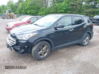 2017 Hyundai Santa Fe 2.4L z VIN 5XYZTDLBXHG431230, wystawiony jako IAAI lot #42302492 z przebiegiem 185 291 mil mil oraz . Historia ofert i sprzedaży dostępna na DreamBid. Obrazek 2.
