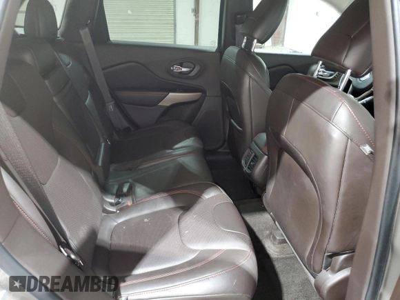 2017 Jeep Cherokee Trailhawk L Plus z VIN 1C4PJMBB4HW593615, wystawiony jako Copart lot #56342885 z przebiegiem 88 215 mil mil oraz Szkoda całkowita • Salvage title. Historia ofert i sprzedaży dostępna na DreamBid. Obrazek 11.