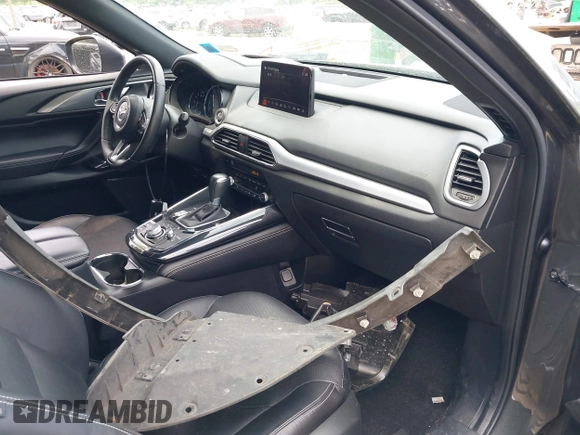 2020 Mazda CX-9 Grand Touring with VIN JM3TCBDY4L0408920, listed as a IAAI auction lot 42325272 with 45,837 mi miles and . Bid and sale history available at DreamBid. Image 5.