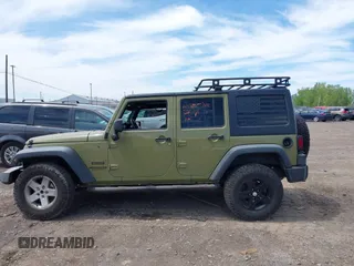 2013 Jeep Wrangler Unlimited Sport z VIN 1C4BJWDG0DL577812, wystawiony jako IAAI lot #42301104 z przebiegiem 138 387 mil mil oraz . Historia ofert i sprzedaży dostępna na DreamBid. Obrazek 14.