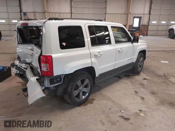 2014 Jeep Patriot Latitude with VIN 1C4NJPFA3ED739925, listed as a IAAI auction lot 41623546 with 130,374 mi miles and . Bid and sale history available at carsss.com. Image 4.