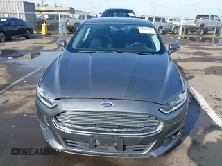 2013 Ford Fusion SE Hybrid with VIN 3FA6P0LU4DR267643, listed as a IAAI auction lot 41846681 with 148,002 mi miles. Bid and sale history available at carsss.com. Image 12.