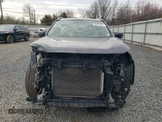 2019 Toyota RAV4 XLE with VIN JTMP1RFV9KD506960, listed as a Copart auction lot 50242025 with 102,157 mi miles and Salvage Title. Bid and sale history available at DreamBid. Image 5.