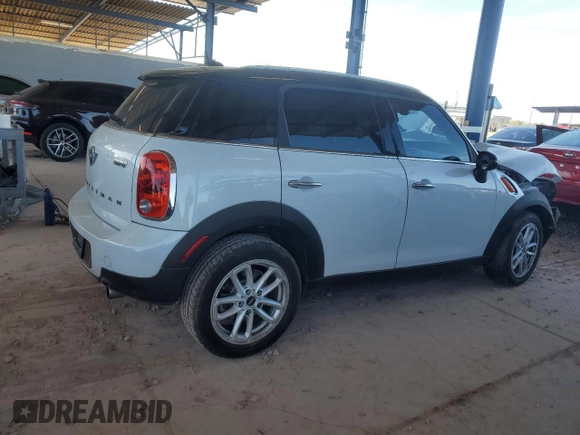 2015 MINI Countryman with VIN WMWZB3C50FWR45253, listed as a Copart auction lot 63608655 with 123,701 mi miles and Salvage title. Bid and sale history available at DreamBid. Image 3.