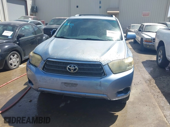 2009 Toyota Highlander Hybrid with VIN JTEEW41AX92033863, listed as a IAAI auction lot 41788531 with 215,787 mi miles. Bid and sale history available at carsss.com. Image 12.