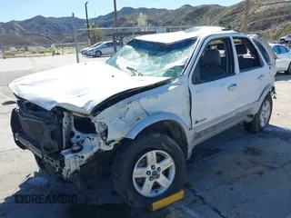 2005 Ford Escape Hybrid with VIN 1FMCU96H55KD91317, listed as a IAAI auction lot 41813426 with 250,978 mi miles. Bid and sale history available at carsss.com. Image 2.
