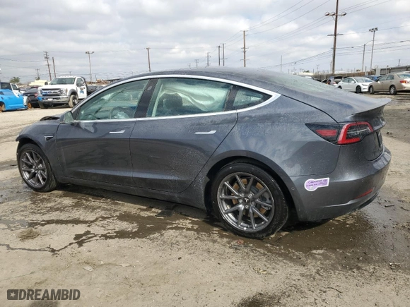 2019 Tesla Model 3 Mid Range with VIN 5YJ3E1EA5KF331294, listed as a Copart auction lot 42534805 with 181,123 mi miles and Salvage Title. Bid and sale history available at carsss.com. Image 2.