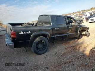 2005 Dodge Dakota SLT z VIN 1D7HW48K45S139614, wystawiony jako Copart lot #83898134 z przebiegiem 200 188 mil mil oraz Szkoda całkowita • Salvage title. Historia ofert i sprzedaży dostępna na DreamBid. Obrazek 3.