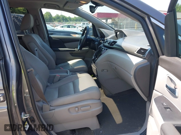 2014 Honda Odyssey EX-L with VIN 5FNRL5H63EB073585, listed as a IAAI auction lot 42673004 with 119,971 mi miles and . Bid and sale history available at DreamBid. Image 5.