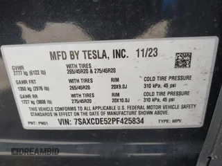 2023 Tesla Model X with VIN 7SAXCDE52PF425834, listed as a IAAI auction lot 41996298 with Not Provided miles and . Bid and sale history available at DreamBid. Image 9.