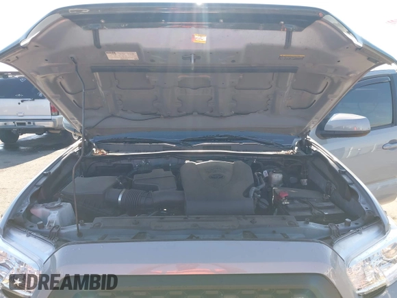 2021 Toyota Tacoma SR5 with VIN 5TFAZ5CN7MX101810, listed as a IAAI auction lot 42454418 with 58,930 mi miles and . Bid and sale history available at DreamBid. Image 10.