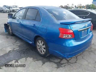 2009 Toyota Yaris with VIN JTDBT903591323255, listed as a IAAI auction lot 41933401 with 88,558 mi miles and . Bid and sale history available at DreamBid. Image 3.