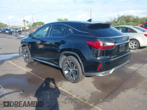 2016 Lexus RX 450h with VIN 2T2BGMCA9GC002373, listed as a IAAI auction lot 41473741 with 85,493 mi miles and . Bid and sale history available at DreamBid. Image 3.