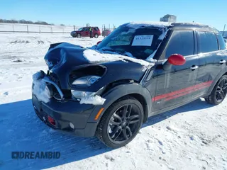 2011 MINI Countryman S with VIN WMWZC5C50BWL55234, listed as a IAAI auction lot 41323339 with 134,709 mi miles and . Bid and sale history available at DreamBid. Image 6.