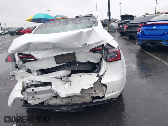 2020 Tesla Model 3 Standard Range Plus with VIN 5YJ3E1EA2LF740225, listed as a IAAI auction lot 41781554 with 46,703 mi miles. Bid and sale history available at carsss.com. Image 15.