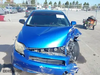2006 Scion tC with VIN JTKDE167560136252, listed as a IAAI auction lot 42000724 with 168,727 mi miles. Bid and sale history available at carsss.com. Image 12.