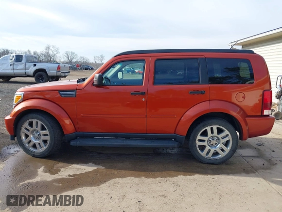 2007 Dodge Nitro SLT with VIN 1D8GU58K37W720763, listed as a IAAI auction lot 41821791 with 115,205 mi miles and . Bid and sale history available at DreamBid. Image 14.