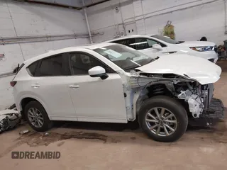 2024 Mazda CX-5 2.5 S Preferred Package with VIN JM3KFBCLXR0503127, listed as a IAAI auction lot 41295902 with 2,423 mi miles. Bid and sale history available at carsss.com. Image 13.