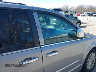 2013 Chrysler Town & Country Touring L with VIN 2C4RC1CG6DR660858, listed as a IAAI auction lot 41970976 with 140,299 mi miles and . Bid and sale history available at DreamBid. Image 20.