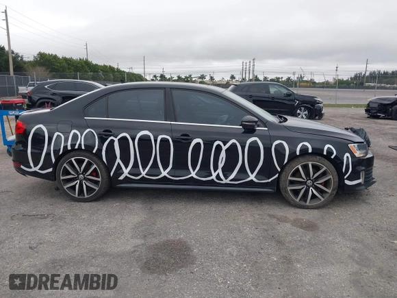 2012 Volkswagen Jetta GLI Autobahn with VIN 3VW5A7AJ0CM065108, listed as a IAAI auction lot 41398932 with 142,441 mi miles and . Bid and sale history available at DreamBid. Image 14.