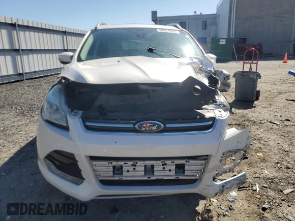 2016 Ford Escape Titanium with VIN 1FMCU9J95GUC74411, listed as a Copart auction lot 50061075 with 198,865 mi miles and Salvage Title. Bid and sale history available at DreamBid. Image 5.
