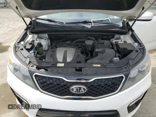 2012 Kia Sorento SX z VIN 5XYKWDA25CG280219, wystawiony jako Copart lot #54397025 z przebiegiem 197 685 mil mil oraz Szkoda całkowita • Salvage title. Historia ofert i sprzedaży dostępna na DreamBid. Obrazek 11.