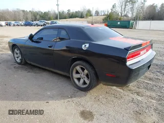 2013 Dodge Challenger SXT z VIN 2C3CDYAG0DH511323, wystawiony jako IAAI lot #41369796 z przebiegiem Nie podano mil oraz . Historia ofert i sprzedaży dostępna na DreamBid. Obrazek 3.
