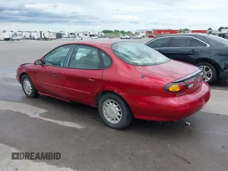 1996 Ford Taurus LX with VIN 1FALP53S2TA221249, listed as a IAAI auction lot 42506786 with 198,272 mi miles and . Bid and sale history available at DreamBid. Image 3.