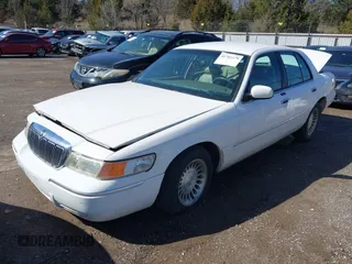2002 Mercury Grand Marquis LS Premium z VIN 2MEFM75W92X641347, wystawiony jako IAAI lot #41701179 z przebiegiem 79 942 mil mil oraz . Historia ofert i sprzedaży dostępna na DreamBid. Obrazek 2.