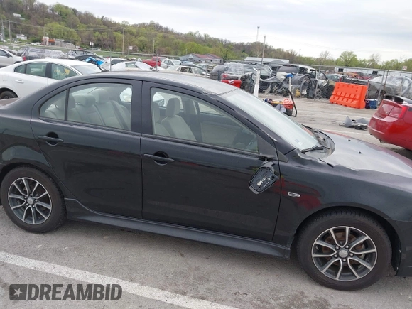 2015 Mitsubishi Lancer SE with VIN JA32V2FW2FU002303, listed as a IAAI auction lot 41927592 with 32,444 mi miles. Bid and sale history available at carsss.com. Image 12.