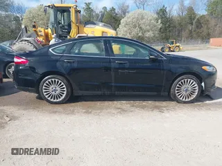 2016 Ford Fusion Titanium with VIN 3FA6P0K92GR284491, listed as a IAAI auction lot 41824323 with 148,016 mi miles. Bid and sale history available at carsss.com. Image 13.