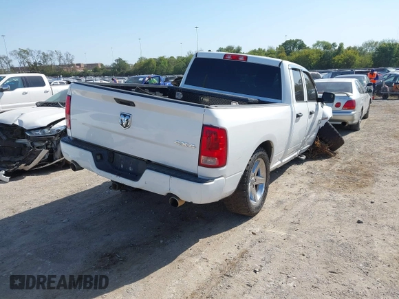 2014 Ram 1500 Express with VIN 1C6RR7FT3ES375696, listed as a IAAI auction lot 40559872 with 201,612 mi miles. Bid and sale history available at carsss.com. Image 4.