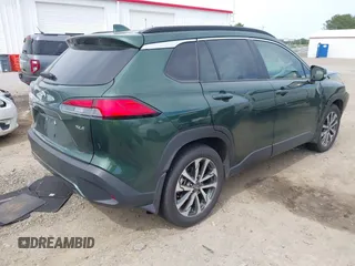 2023 Toyota Corolla Cross XLE with VIN 7MUEAAAG9PV053569, listed as a IAAI auction lot 42319709 with 71,105 mi miles and . Bid and sale history available at DreamBid. Image 4.