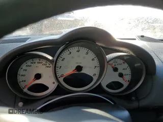 2006 Porsche Cayman S с VIN WP0AB298X6U784188, выставлен на аукционе Copart как лот 77872504 с пробегом Не указан миль и Списание • Salvage title. История ставок и продаж доступна на DreamBid. Изображение 9.