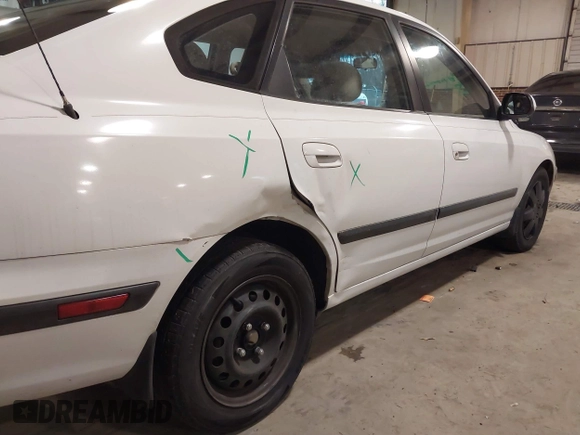 2005 Hyundai Elantra GLS with VIN KMHDN56D65U171907, listed as a IAAI auction lot 41051694 with 103,899 mi miles and . Bid and sale history available at DreamBid. Image 6.