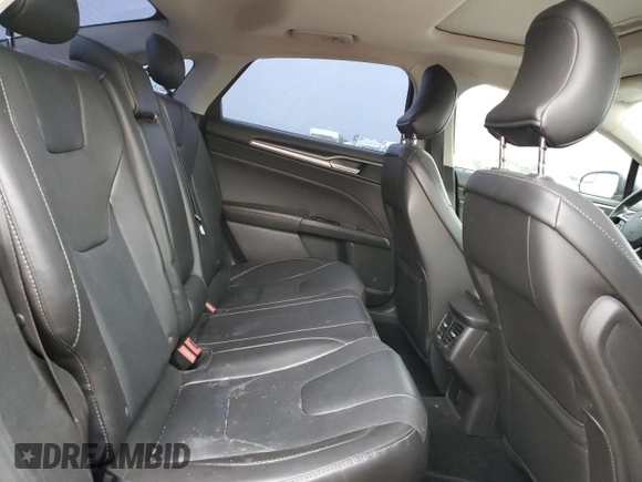 2016 Ford Fusion Titanium with VIN 3FA6P0K98GR164758, listed as a Copart auction lot 55609595 with 153,779 mi miles and Clean title. Bid and sale history available at DreamBid. Image 10.